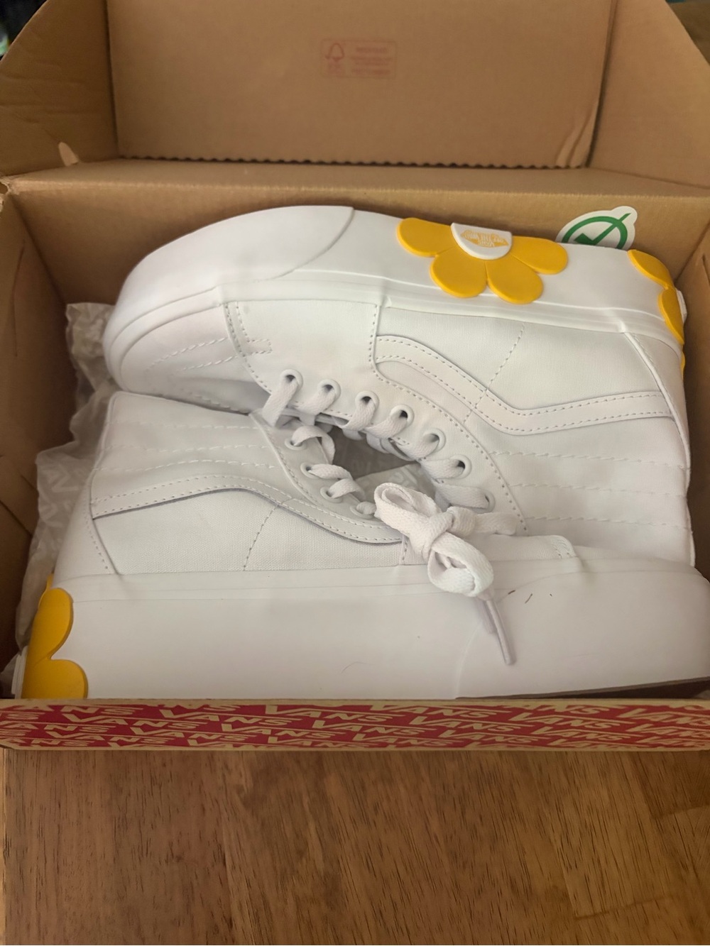 Vans White High-Top Sneakers with Yellow Flower Accent